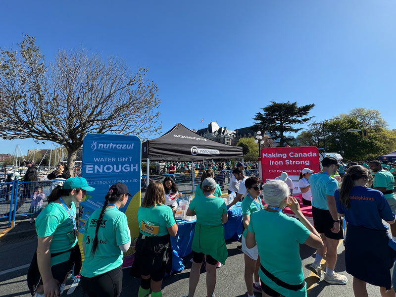 Runners gathered at the Pharmaris and Nutrazul booths at the TC10K in Victoria